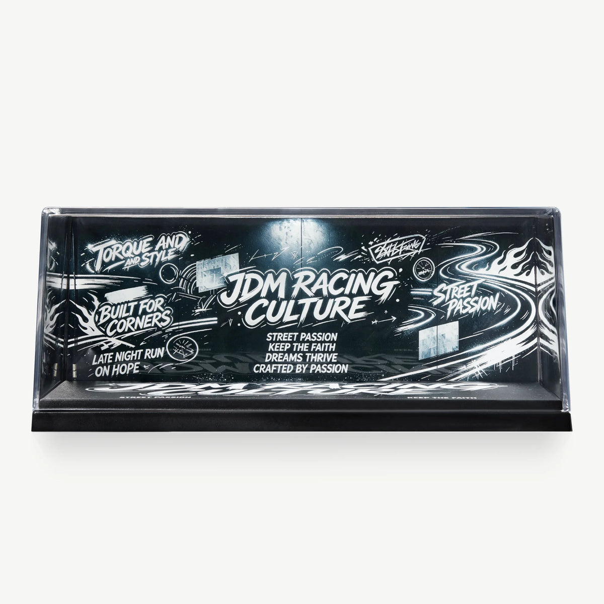 LUXEMARK Black-and-white JDM Racing Culture graphic backdrop inside a clear display case